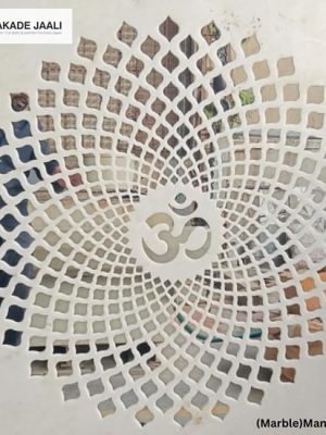 Elegant mandir backdrop with Om symbol jaali design in marble
